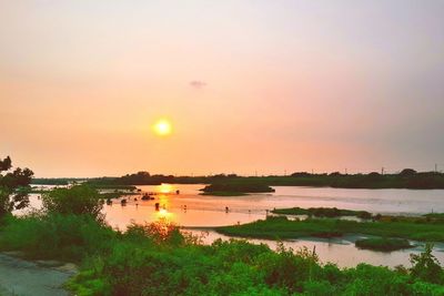 Scenic view of sunset over sea