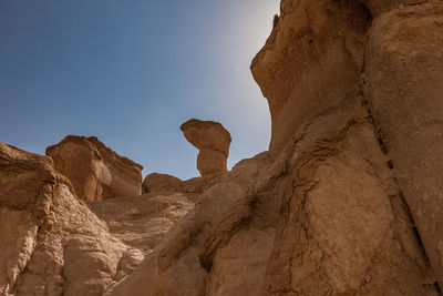 Sandstone formations around al khobar caves, jebel qarah