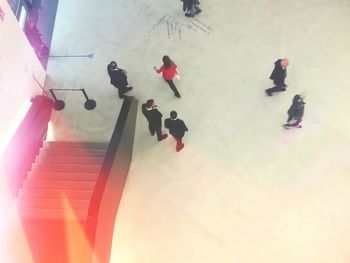 High angle view of people on floor