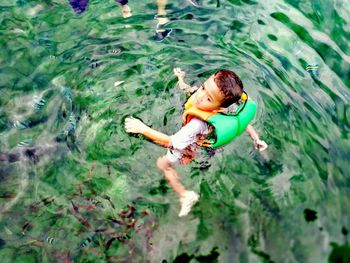 High angle view of boy in water