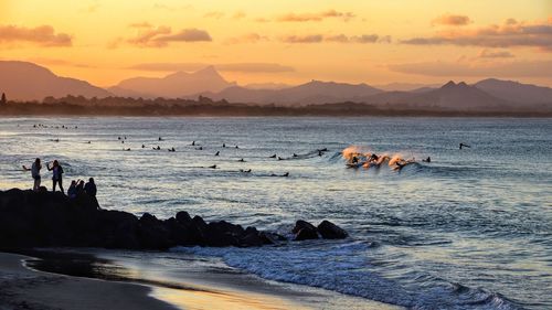 Scenic view of sea against sky during sunset