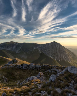 Scenic view of mountains against sky during sunset