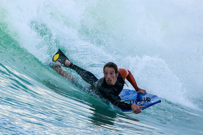 Man surfing in sea