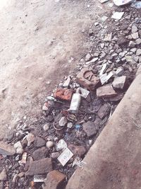 High angle view of garbage on rocks