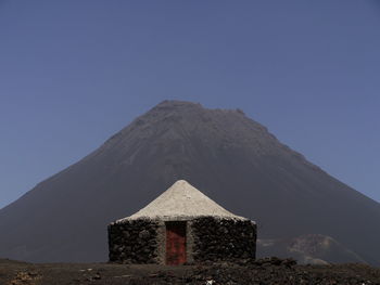 Built structure on volcan fogo against clear sky, cap verde