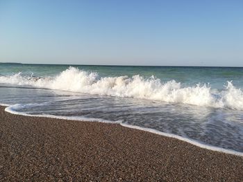 Scenic view of sea against clear sky