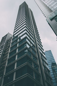 Low angle view of skyscrapers against sky