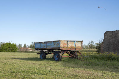 Built structure on field against clear sky