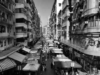 High angle view of street amidst buildings