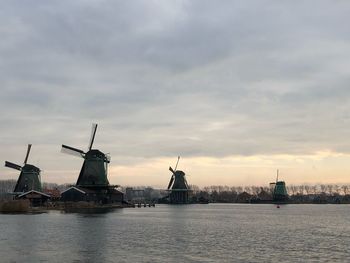 Traditional windmill against sky