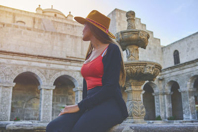 Tourist woman walking on vacation in street, arequipa, peru. selective focus