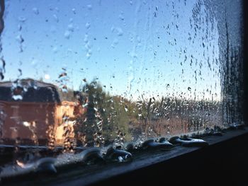 Close-up of water drops on glass