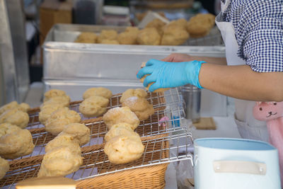 Close-up of person preparing food