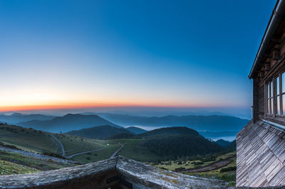 Scenic view of mountains against sky during sunset