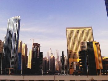 Low angle view of modern buildings against sky
