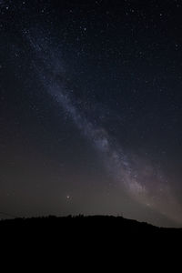 Low angle view of stars in sky at night