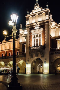 Low angle view of illuminated building at night