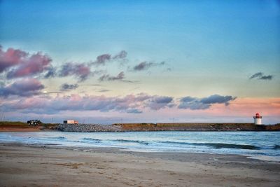 Scenic view of beach during sunset