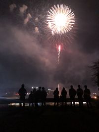 Firework display at night