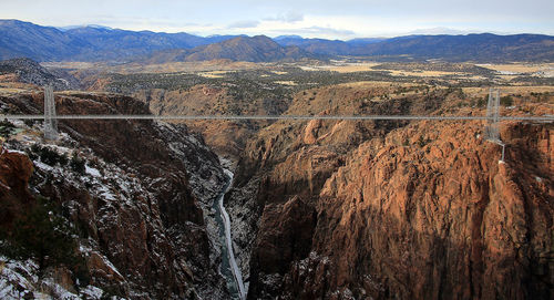 Royal gorge bridge over colorado river against sky