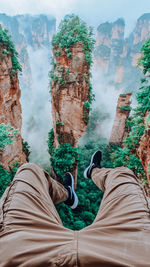 Low section of man on rock