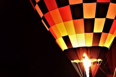 Illuminated hot air balloon at night