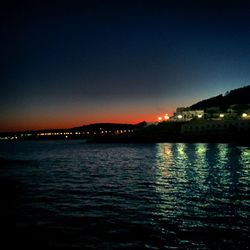 View of illuminated city at night