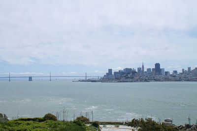 View of cityscape with river in background