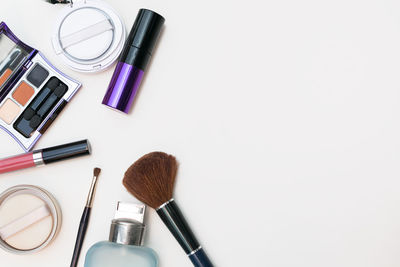 High angle view of beauty products on white background