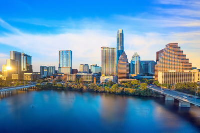 Buildings in city against sky