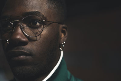 Close-up portrait of man looking away