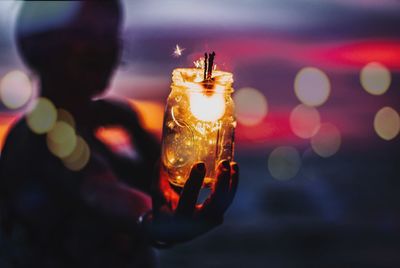 Close-up of illuminated christmas lights at night