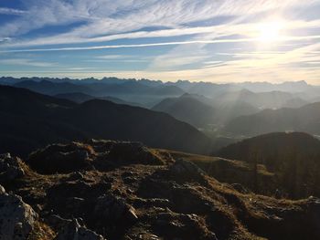 Aerial view of mountains against sky during sunset