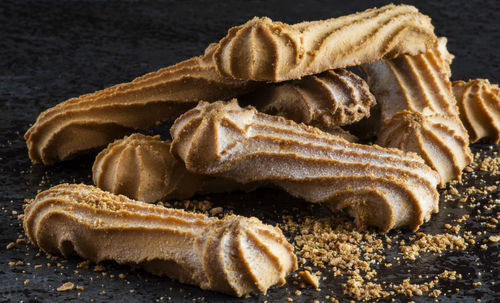 Close-up of bread on black background