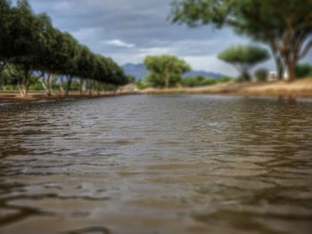 Surface level of water against sky