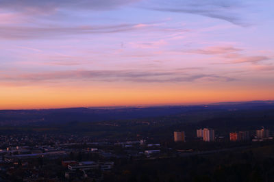 High angle view of buildings against sky during sunset