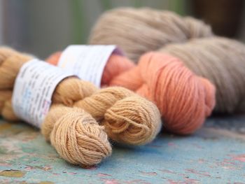 Close-up of alpaca skeins on a table