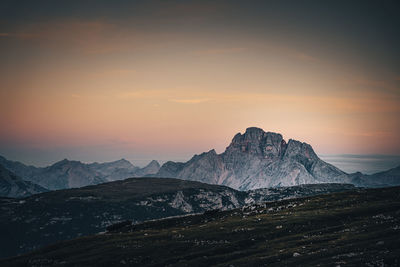 Scenic view of mountains against sky during sunset