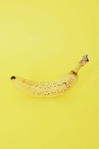 Close-up of bananas against white background