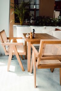 Simplistic interior of cafe with wooden tables