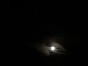 Low angle view of moon against sky at night