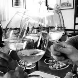 Close-up of hand holding beer glass