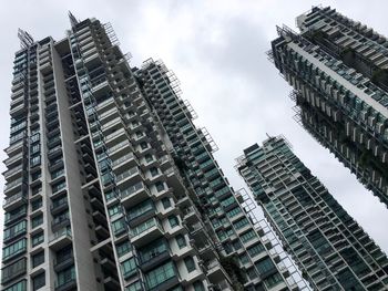 Low angle view of skyscrapers against sky