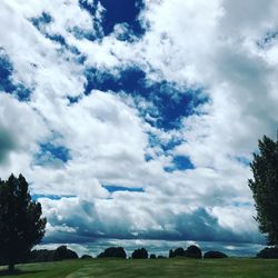 Low angle view of cloudy sky over landscape