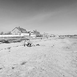 People on beach against sky