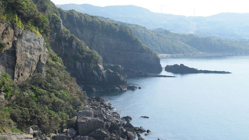 Scenic view of sea and mountains