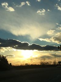 Scenic view of landscape against sky at sunset