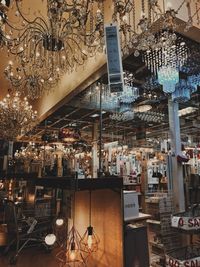 Illuminated restaurant at market stall