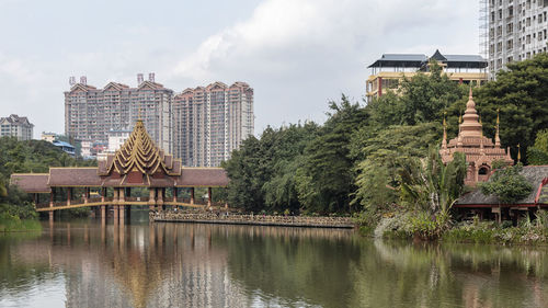 View of buildings against cloudy sky