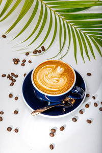 Close-up of cappuccino on table